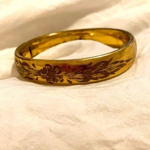Gold plated hinged bangle. Some plating  loss.